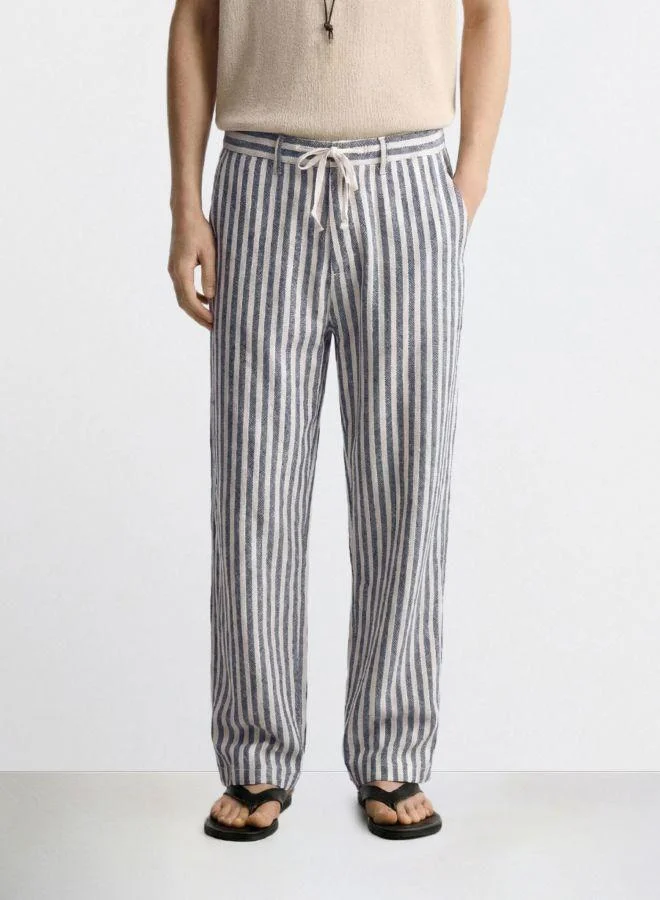 The Indian Garage Co Men Loose Fit Vertical Striped Cross Pocket Mid-Rise Trousers